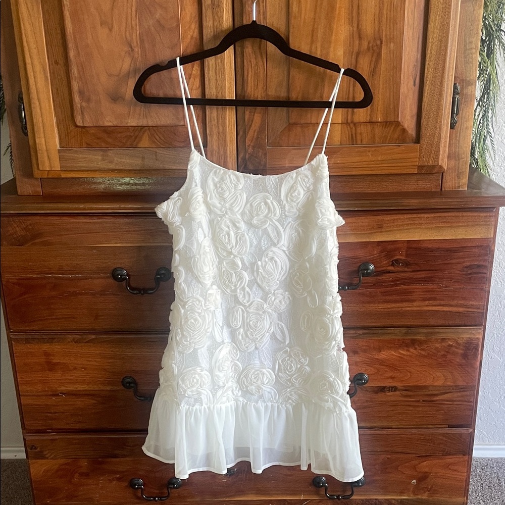 White Rosette Mini Dress with Ruffle Hem